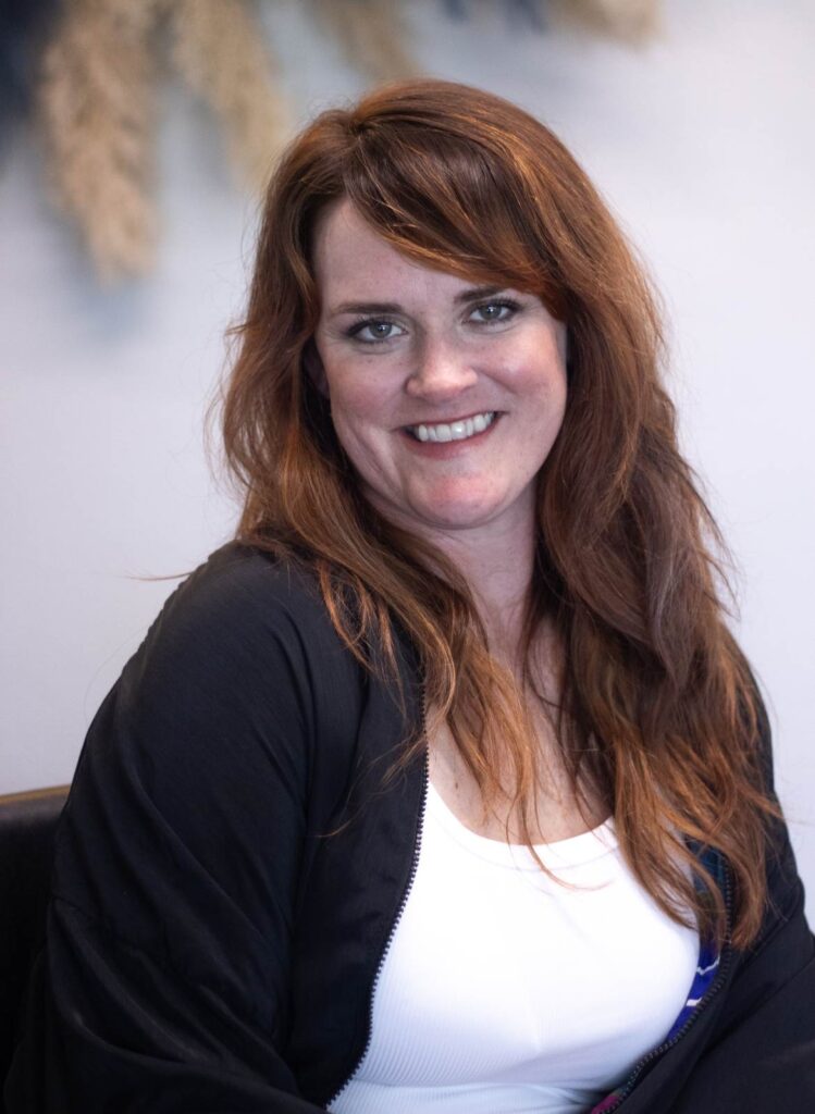 Mollie Mcdonald, expert hair stylist of the studio headshot.