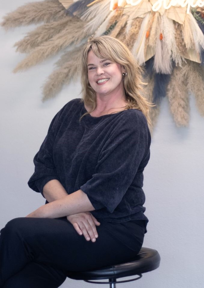 Hillary Bratcher the in house massage therapist with a super beautiful smile.